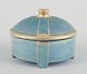 Josef Ekberg 
for 
Gustavsberg.
Bonbonniere in 
porcelain. 
Hand-painted in 
lustre glaze, 
gold ...