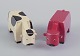 Kay Bojesen 
(1886-1958), 
Danish 
designer.
Two early 
wooden figures 
in the shape of 
cows.
Mid ...