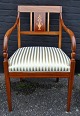 Danish empire 
style armchair 
in mahogany 
with intarsia. 
...