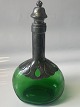 Green carafe with tin.
Danish design.
Height.: 25 cm.