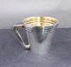 Christening mug 
on stand of 
Danish solid 
silver H 6cms 
...