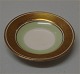 Royal 
Copenhagen 
Dagmar #988 
dinnerware 
9111-988 Butter 
pad 7,5 cm. 
Green porcelain 
with wide ...