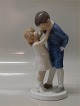 Bing and 
Grondahl B&G 
1781 Girl and 
boy Michaela 
Ahlmann 21 cm 
21 cm Marked 
with the three 
Royal ...