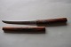 An old paper 
knife/paper 
cutter with a 
handle made of 
wood
The paper 
knife is good 
working ...