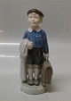 Royal Copenhagen 4528 June - boy with briefcase Design Hans Henrik Hansen 1894-1965. HHH 1st. In ...