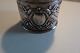 Napkin ring 
made of silver
With initials
Diam: 5cm W: 
3,5cm 
In a good 
condition, but 
with a ...