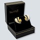 Anette Kræn; A 
pair of 
earrings/studs 
made of 
sterling 
silver, bone, 
and gold-plated 
silver. ...