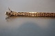 A rear bracelet 
of gold in a 
brick pattern
14 Karat, 5 
rows
Decorated with 
a special ...