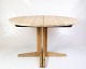 Round dining 
table with 
extension in 
solid pine from 
the 1970s. Made 
with a 
three-legged 
frame ...