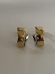 Earrings with a 
zircon in 14 
carat white 
gold / red 
gold,
Stamped JAa. 
585.
Length 1.3 ...