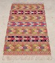 Swedish textile 
artist.
Handwoven wool 
tapestry.
Multicolored.
Geometric 
patterns.
With ...