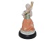 Royal 
Copenhagen 
Overglaze 
figurine, Girl 
with the Horn 
of Gold.
Decoration 
number ...