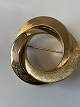 14 Karat gold brooch
Diameter 3.6 cm.