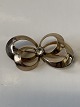 8 Karat gold, 
brooch with 
clear stone
Stamp: HS HS
Length 3.6 cm.
Height 1.9 ...