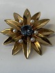 14 Karat gold 
brooch with 
blue stones and 
pearls
Stamp: HS. 585
Diameter 4.0 
...