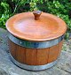 Stave-bodied 
teak cheese 
container with 
lid, 20th 
century 
Denmark. 
Height: 21 cm. 
Dia.: 24 ...