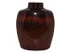 Royal 
Copenhagen art 
pottery, unique 
brown vase with 
an great glaze 
designed and 
signed by ...