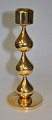 A drop 
candlestick, 
Design 
Asmussen, 20th 
century 
Denmark. Gold 
plated. 
Stamped. H .: 
17 cm. ...