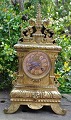 French bronze 
mantel clock, 
19th century. 
With 
decorations. 
Dial with 
Arabic 
numerals. H.: 
36 ...