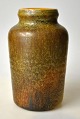 Nielsen, Ejvind 
(1916 - 1988) 
Denmark: Vase. 
Ceramic. With 
green, yellow 
and brown 
glaze. ...
