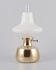Henning Koppel 
for Louis 
Poulsen.
Petronella oil 
lamp in brass 
with opal glass 
shade.
Designed ...