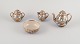 Satsuma, Japan. 
An egoist tea 
set consisting 
of a teapot, 
sugar bowl, 
creamer, and 
...