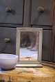 Swedish 19th 
century, small 
mirror with 
small shelf 
underneath (
barber mirror) 
in wood with 
...