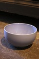 Royal 
Copenhagen 4 
All Seasons 
faience bowl 
with blue glaze 
designed by 
Grethe Meyer 
(1918-2008) ...