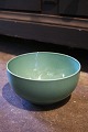 Royal 
Copenhagen 4 
All Seasons 
faience bowl 
with green 
glaze designed 
by Grethe Meyer 
...