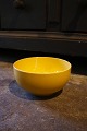 Royal 
Copenhagen 4 
All Seasons 
faience bowl 
with yellow 
glaze designed 
by Grethe Meyer 
...