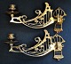 A pair of 
Danish Art 
Nouveau piano 
chandelliers, 
circa 1900. 
Decorated with 
floral 
ornaments. L: 
...