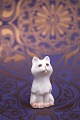 Small porcelain 
cat from Bing & 
Grondahl. 
Decoration 
number: 2527. 
1st grade. H: 
4.5cm.