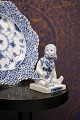 Royal 
Copenhagen, 
small Blue 
Fluted sitting 
girl. 
Decoration 
number: 1/4793. 
1st grade. H: 
...
