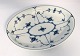 Royal 
Copenhagen. 
Mussel painted, 
fluted. Oval 
salad dish. 
Model 24. 
Length 25 cm. 
Width 19.5 ...