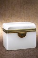 Antique 19th 
century sugar 
box in white 
opal glass with 
bronze 
mounting. H: 
9.3cm. L&W: 
12x8cm.