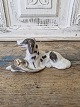 Royal 
Copenhagen 
Figurine - Dog 
with pheasant 
No. 1533, 
Factory first
Height 7.5 cm.
Design: ...