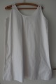 Shift / dress short and without sleeves
An antique shift with hand made buttonholes and 
embroidered hand-made initials
The antique, Danish linen and fustian is our 
speciality