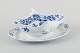 Meissen, 
Germany. Blue 
Onion porcelain 
gravy boat with 
two handles on 
a ...