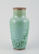 Unknown French 
ceramicist.
Vase of 
stoneware. 
Crystal glaze 
in green tones.
Brass fitting 
at ...