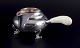 Georg Jensen 
Blossom creamer 
in hand 
hammered 
sterling silver 
with bone 
handle. 
Model 2C. ...