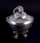 Georg Jensen 
Blossom sugar 
bowl in hand 
hammered 
sterling 
silver.
Model 2E.
Hallmarked 
with ...