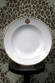 Royal 
Copenhagen deep 
plate in white 
hotel porcelain 
/ iron 
porcelain, with 
gold rim and 
...