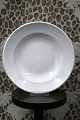 Royal 
Copenhagen deep 
plate in white 
hotel porcelain 
/ iron 
porcelain.Dia.: 
23.5cm. 
Decoration ...