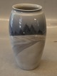 B&G 8325-254 
Vase with 
winther scenery 
13.5 cm Bing 
and Grondahl 
Marked with the 
three Royal ...