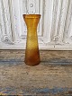 Hyacinth glass 
in amber glass 
with a net 
pattern. 
Height 22.5 
cm.