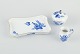 Royal 
Copenhagen Blue 
Flower Curved, 
sugar bowl and 
creamer on a 
tray.
Hand-painted 
in blue. ...