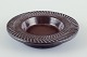 Ingrid 
Atterberg for 
Upsala Ekeby.
Round dish 
made of 
stoneware.
Glaze in brown 
tones.
Model ...