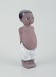 Mari Simmulson 
for Upsala 
Ekeby.
Figure of a 
child. Glazed 
stoneware.
Handmade.
Model: ...