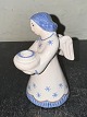 Figure of a 
painted angel 
in ceramic as a 
candle holder 
from the 
Bornholm 
pottery factory 
...