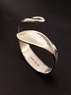 GEORG JENSEN 
Hans Hansen 
des. Bent 
Gabrielsen 
sterling silver 
bangle 214 6.7 
x 5.3 cm. item 
no. ...